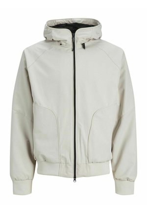 Chaqueta beige claro con cremallera frontal, capucha y puños elásticos. Cuenta con bolsillos laterales y una textura suave y mate.