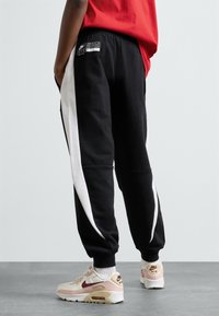 Nike Sportswear - AIR UNISEX - Pantaloni de trening - black/white Imagine miniatură 1