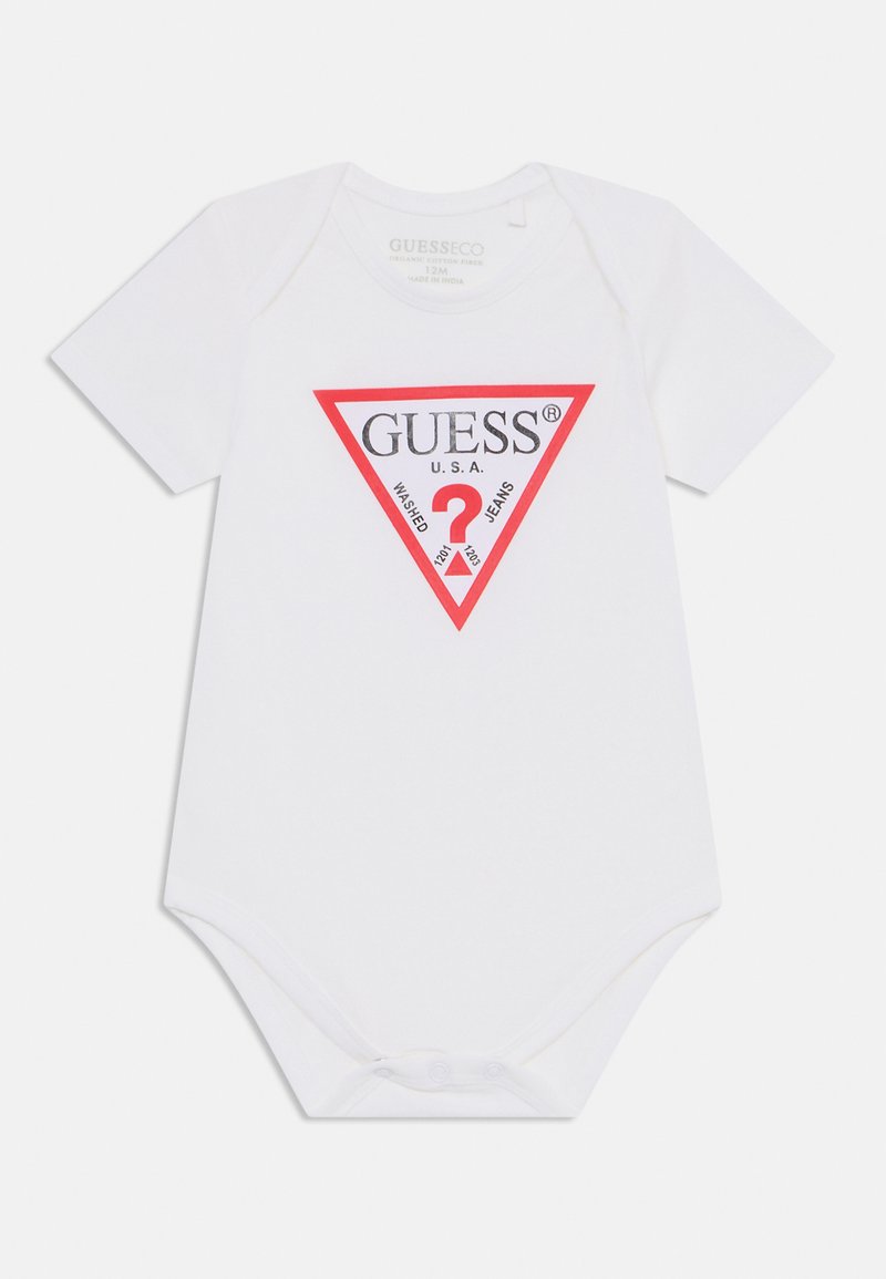 White cotton baby bodysuit with short sleeves, featuring a red triangle logo with the text "GUESS U.S.A. WASHED JEANS" and a question mark.