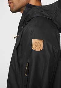 Fjällräven KEB ECO-SHELL JACKET M - Hardshell striukė - black