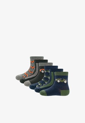 Six pairs of children's ankle socks in gray, black, navy, and green with car and truck patterns, arranged in a row on a white background.
