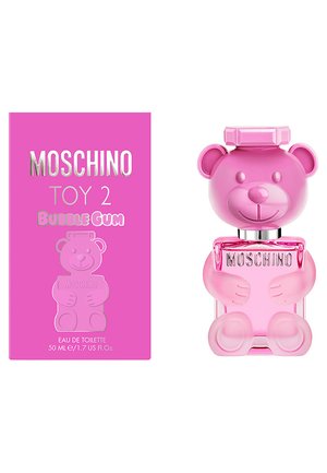 Bouteille en forme d'ours rose avec des caractéristiques arrondies et un visage souriant. Capuchon argenté et logo, accompagnée d'une boîte rose vif avec un design d'ours.