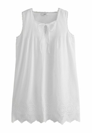 Weiße ärmellose Bluse mit quadratischem Ausschnitt, Frontbinde, plissiertem Oberteil, Spitzenbesatz und besticktem wellenförmigem Saum.