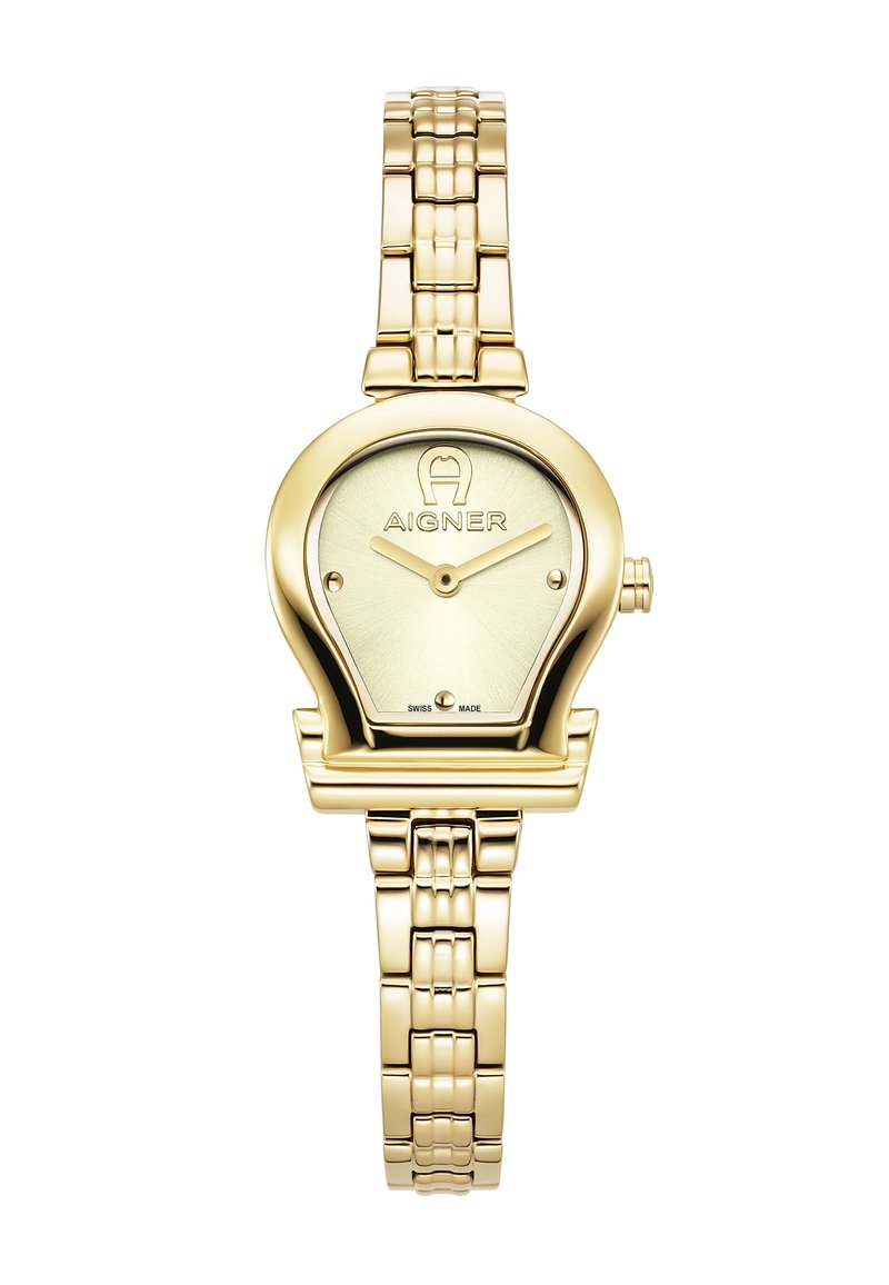 Reloj de pulsera de metal dorado con una caja de forma única, una esfera crema con la marca Aigner y una correa de eslabones. Suizo.
