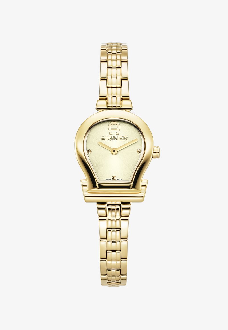 Reloj de pulsera de metal dorado con una caja de forma única, una esfera crema con la marca Aigner y una correa de eslabones. Suizo.