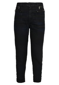 Mustat slim-fit farkut, joissa on vetoketjulliset etutaskut, sileä denim-pinta ja kapeneva lahkeiden muoto. Varustettu nappisuljennalla ja keskipitkällä vyötäröllä.