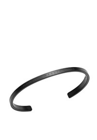 Fekete fém karkötő sima, matt felülettel. Az ékszer szalagján gravírozott "DANIEL WELLINGTON" felirat található. Nyitott végű dizájn.