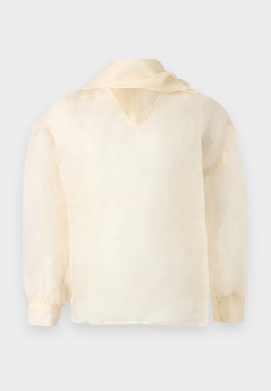 Šviesiai ruda permatoma palaidinė su ilgomis rankovėmis, V formos iškirpte ir laisvo kirpimo. Minkšta tekstūra su minimalistiniu dizainu ir be matomų raštų.