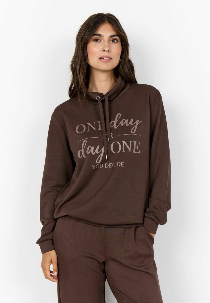 Brown hoodie with a cowl neck, featuring a printed design that reads "ONE day or day ONE YOU DECIDE." Soft fabric, relaxed fit.