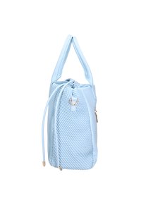 Borsa a tracolla azzurro chiaro con un motivo trapuntato su un lato, finitura liscia sull'altro, manico regolabile e hardware in tonalità oro.