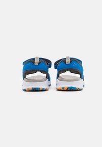Superfit CRISS CROSS UNISEX - Vaellussandaalit - blau/orange