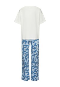 Cotton blend outfit featuring a white short-sleeve top and blue patterned wide-leg pants with abstract white shapes.
