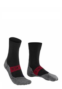 Calcetines negros y grises con un diseño de punto acanalado, acentos rojos y suelas acolchadas. Secciones distintas para mayor comodidad y soporte.
