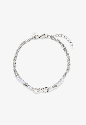 Doppeltes Silberkettenarmband mit einem Unendlichkeitssymbol als Mittelpunkt und kleinen durchscheinenden weißen Perlen auf beiden Seiten.
