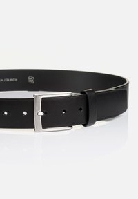Black leather belt with a silver metal buckle, featuring a single prong and multiple adjustment holes, smooth texture, and minimal design.