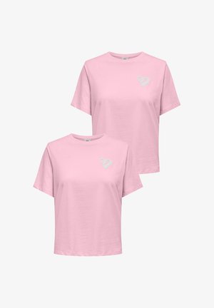 Pink cotton T-shirts with short sleeves and a round neckline. Each features a small, fluffy heart logo on the chest.