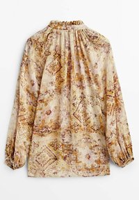 Blouse à manches longues en tissu léger et texturé, présentant un motif abstrait multicolore en beige, or et mauve avec un col froncé.