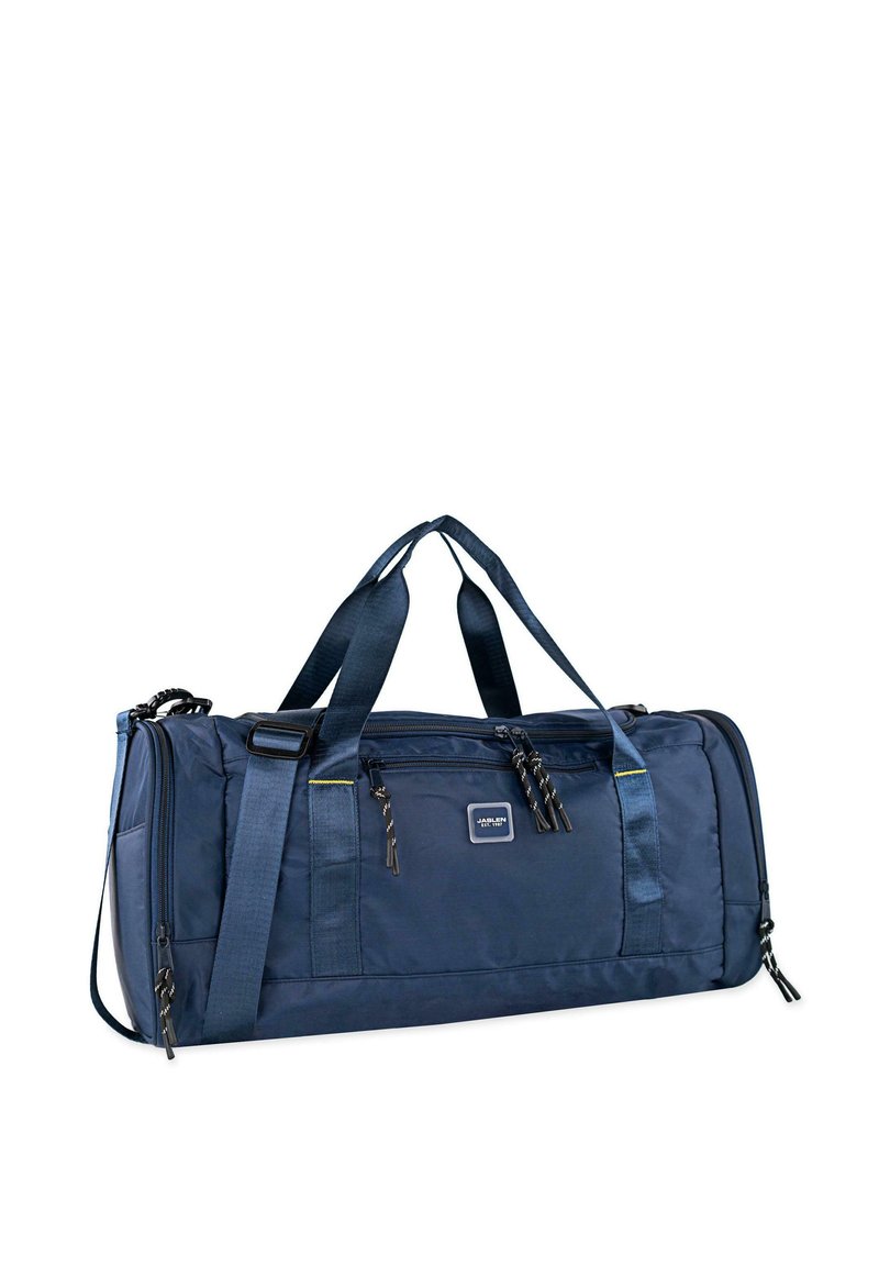 Bolsa de deporte azul marino con material de nailon suave, doble asa en la parte superior, correa de hombro ajustable, bolsillo frontal con cremallera y parche con el logo.