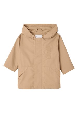 Beige toddler raincoat with hood, flap covering front zipper, two front pockets, and long sleeves.