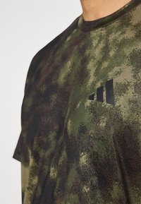 adidas Performance SEA TEE - Camiseta deportiva - olive strata