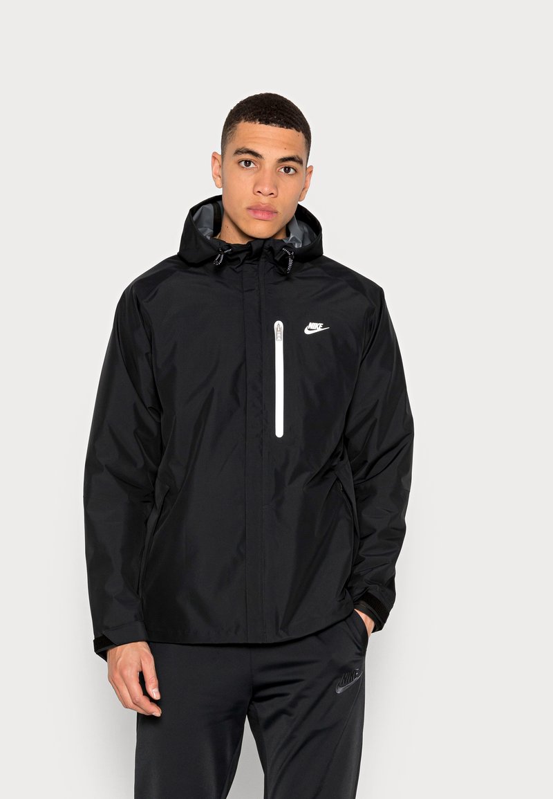 Nike Sportswear Waterproof jacket - black/black/black - Zalando.co.uk