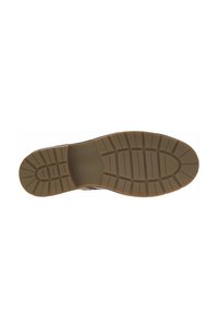 Semelle en caoutchouc avec une surface texturée, comportant de profonds cannelures de traction et un talon arrondi. Couleur : beige avec des accents marron.