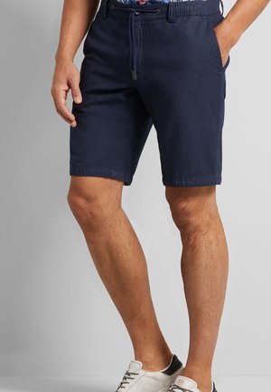 Marineblå shorts lavet af letvægtsstof, med snøre i taljen, sidelommer og lige ben. Glat tekstur.