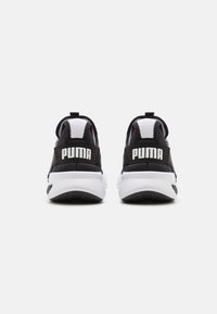 Puma ENZO EVOLVE - Zapatillas running asfalto - black/white