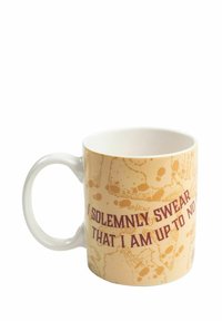 Tazza in ceramica con finitura lucida. Sfondo crema con una citazione marrone: "Giuro solennemente che non ho buone intenzioni" circondata da un motivo sottile.