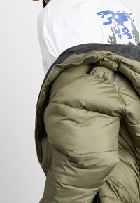 Columbia Vinterkappa /-rock - green