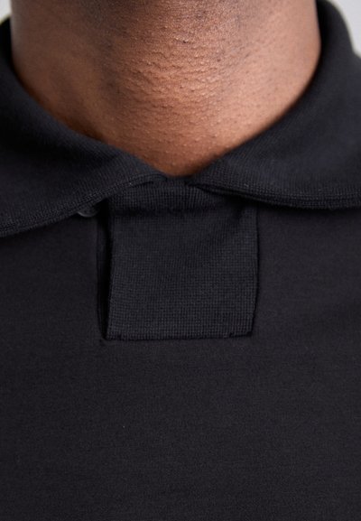 GmbH KONRAD - Polo shirt - black