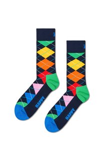 Calcetines de argyle de color azul oscuro con diamantes vibrantes en amarillo, naranja, rojo y verde, con talones verdes y puntas de color azul claro.