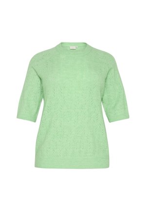 Gaiši zaļš adīts svārks ar īsām piedurknēm, ar teksturētu lapu rakstu. Ribota kakla izgriezuma un piedurkņu. Mīksts, viegls materiāls.