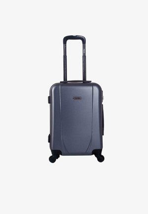 Maleta rígida compacta en gris oscuro con un acabado texturizado, manija extensible y cuatro ruedas que se deslizan suavemente. Cuenta con un cierre de cremallera.