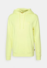 Heldere gele hoodie van zacht materiaal, met een voorzak, een capuchon met trekkoord en een vierkant logo op de borst.