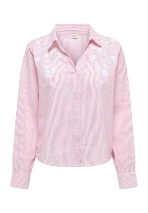 Roosa ja valge triibuline särk, millel on valged broderaaditud lillemotiivid rinnal. Pikkade varrukatega, millel on nööbid mansettides.