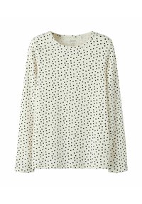 Kremowa bluzka z długim rękawem o prążkowanej fakturze, zdobiona drobnym wzorem czarnych kropek na całej powierzchni oraz okrągłym dekoltem.