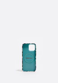 Funda de teléfono con un interior turquesa y un exterior estampado en crema y negro. Detalle central en círculo con el texto rojo "BIMBA Y LOLA."