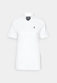 Weißes Polo-Shirt aus glattem Stoff mit klassischem Kragen und kurzen Ärmeln. Schwarzes Logo auf der linken Brust. Knöpfe vorne.