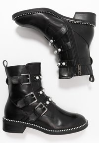 Tamaris Botines camperos - black