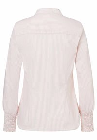 Lyserød langærmet skjorte med tynde hvide striber. Har et smocked manchettedesign og en klassisk krave. Glat tekstur, tætsiddende pasform.