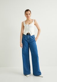 Koton Vaqueros a campana - blue denim