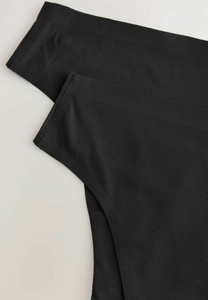 Svart ribbad tyg med en slät yta och en åtsittande design, med rundade kanter och rena sömmar, lämplig för klädesplagg.