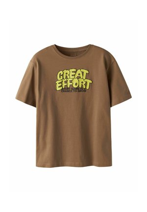 Brown cotton t-shirt featuring a graphic design in bright yellow and black that reads "GREAT EFFORT" with "EVERY GAME IS A CHANCE TO GROW" below.