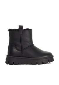 Black ankle boots made of leather with a suede interior, featuring a flat, textured rubber sole and a rear pull tab for easy wear.