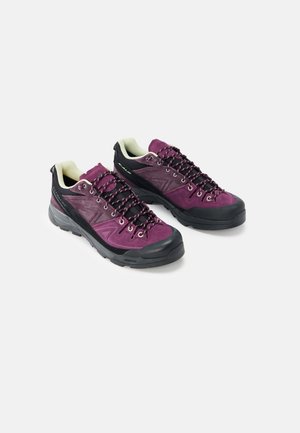Purple and black hiking shoes with a textured suede upper, reinforced rubber toe cap, and multi-color laces. Sturdy soles for traction.