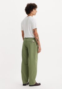Levi's® - Chinosy