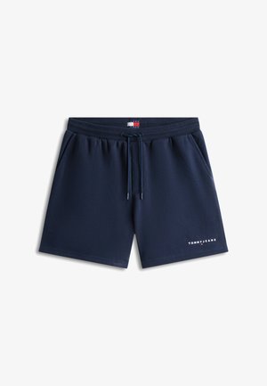 Tumesinised vabaajashortsid nööriga vöökohal, küljetaskutega, Tommy Jeans logo vasakul säärel ja väike Tommy Hilfigeri lipp vöökohal keskel.