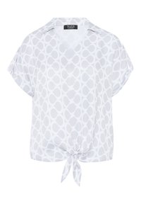 Witte blouse met korte mouwen en een V-hals, met een knoopdetail aan de zoom en een subtiel grijs cirkelpatroon overal.