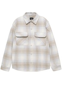 Checkered flannel shirt in beige and light blue. Features two front pockets, a collar, and button closures on a soft, textured fabric.